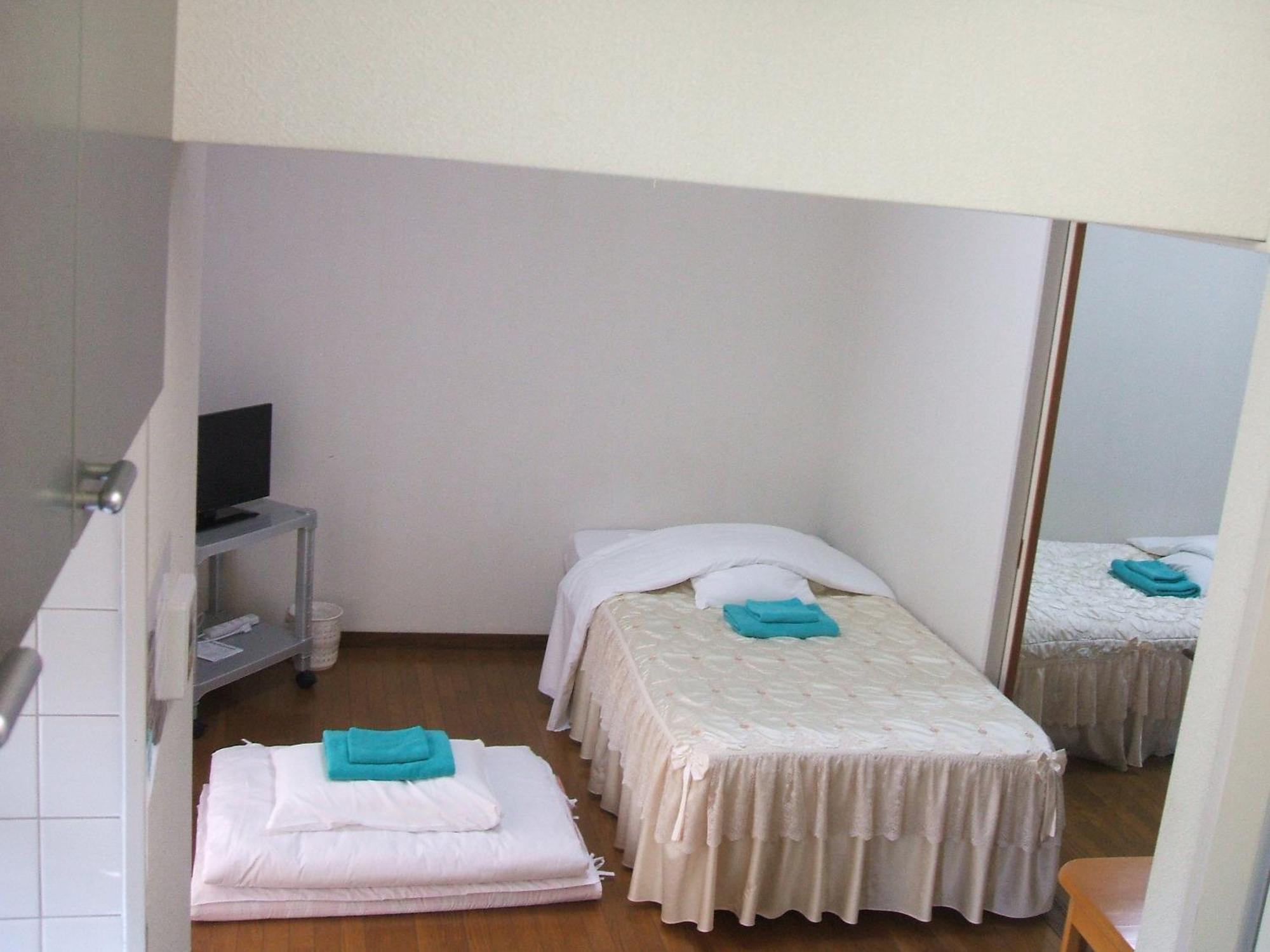 Apartamento Weekly Harbourview Mansion Main Building Naha Habitación foto